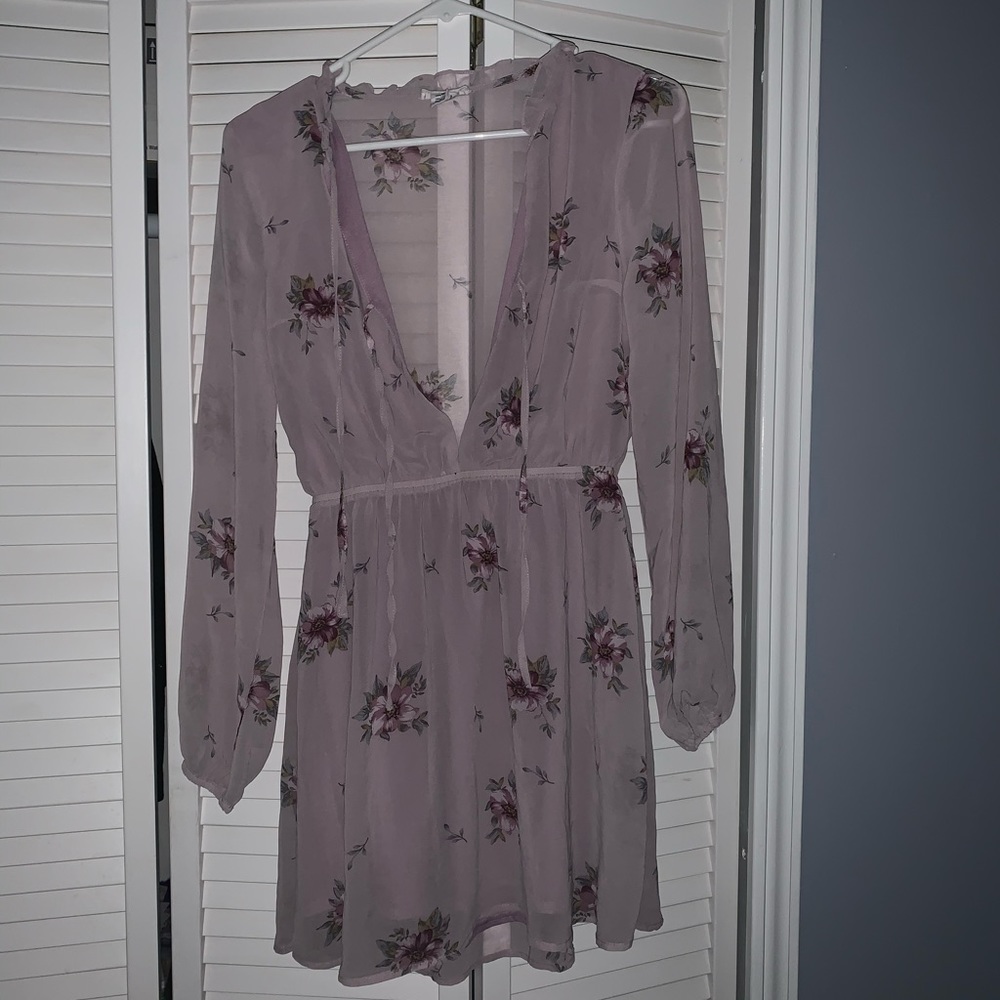 Sheer long sleeve dress.